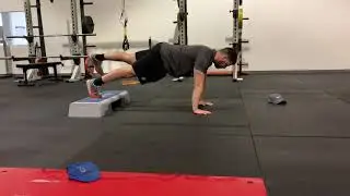 Feet-Elevated Single-Leg Push Ups