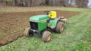 discing the garden with 1975 John Deere 400 and brinly double disc