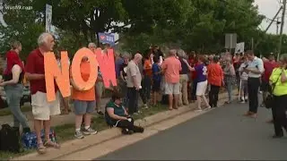 Students march outside of NRA after two mass shootings