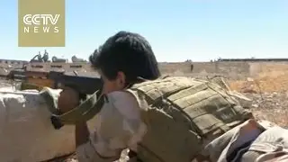Syrian government troops, rebels fight in and around Aleppo
