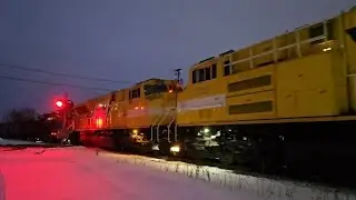 CN M305 Westbound at St Leonard MP 194.3 Jan 9/26 at 17:31 with two Progress Rail engines.