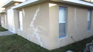 Repairing settling cracks in stucco