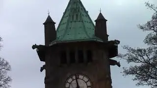 another shot of lindley church bells and clock chiming at 8 pm