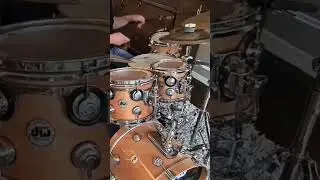 Drumming along a funky groove - DW Collectors twisted birch over maple drums