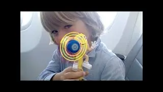 M&M Surprise toys in airplane - Gertit's fly with airplane in summer holidays 2016