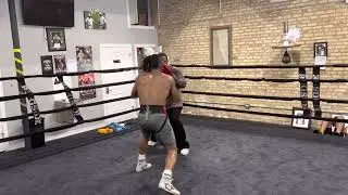 Professional Boxer Semajay Thomas hitting mitts with Nate Jones