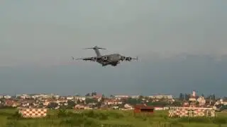 NATO Troops Unloading Vehicles at Sibiu Airport