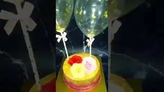 shimmer effect cake with balloon confeti