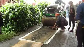 steamroller press