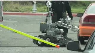 🚨 Police Bomb Squad Robot in Action: Suspicious Briefcase Near Sacramento Water Pump Station