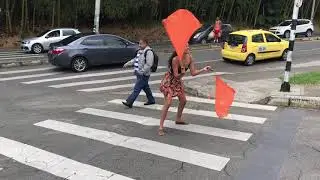 Flag Dancer at Intersection in Medellin, Colombia