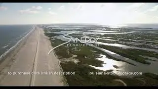 535 Louisiana coast restoration with eroded marsh land swamp aerial drone comparison video stock...