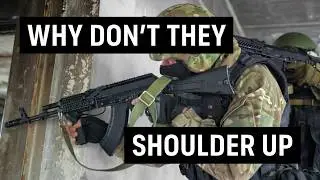 Why don't the Spetsnaz Shoulder the Stock and Hold Their AKs by the Magazine