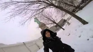 Couple snowball fight on Liberty Island with GoPro