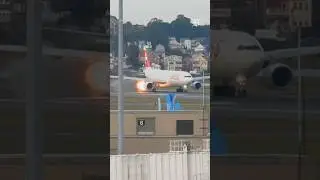Flames shoot from plane at Boston's Logan Airport