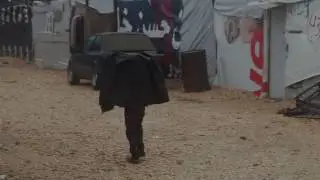 Syrian refugees endure cold, soaking rain in the Bekaa Valley