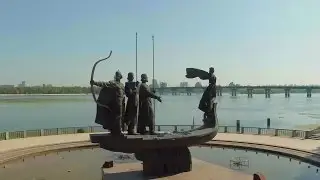 Aerial shot of wide river and monument. Kyiv city, Ukraine. Stock Footage