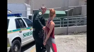FL:WOMAN ARRESTED AFTER PUTTING DOG IN TRUNK (ON CAM) - CNN