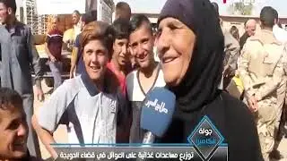 جولة الكاميرا : توزيع مساعدات غذائية على العوائل في قضاء الحويجة
