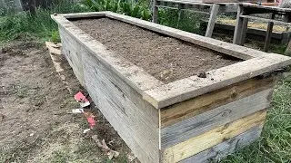 ABSOLUTELY FREE! Repurposed materials means awesome raised garden bed!