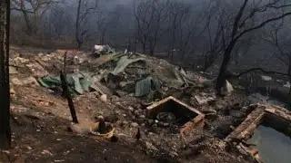 Thousands evacuated in South Africa as storm fans fires