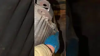 DIY mesh lining for a sauna stove.