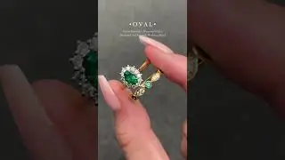 0.70ct Oval Centre GreenEmerald in a diamond halo and a 0.20ct Diamond and green emerald WeddingBand