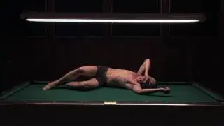 John Kelly Dances on a Pool Table