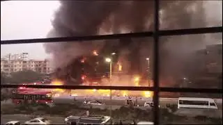 Arshi Shopping Mall on Fire Front View Karachi Aisha Manzil