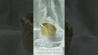 Gold men ring with unique fossil amber