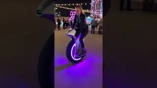 🌃 Tesla One Wheel Motorcycle at Night Tech Expo! Purple LED Lights! 💜⚡