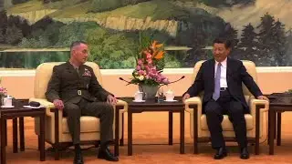 US, China Agree to Improve Military Communications