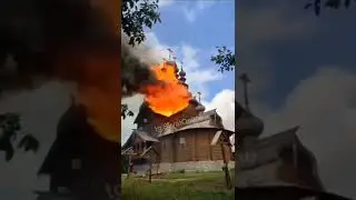 largest wooden church in Ukraine is burning - the wooden All Saints Skete of  Moscow Patriarchate,