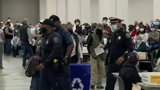 Poll challenger escorted out of TCF Center