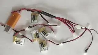 EACHINE E010 RC Quadcopter Spare Parts 3.7V 150mAh Battery with USB Charger Set Unboxing