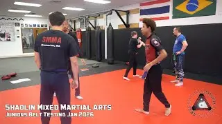 132 Coach Alex working with SMMA Junior during belt testing jan 2026