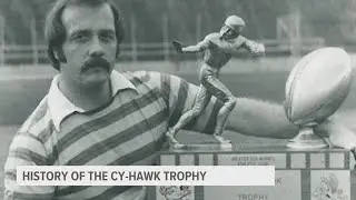 What's the history behind the Cy-Hawk game trophy?