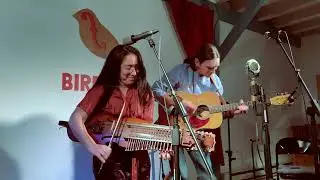 Sandra Wong and Jon Sousa  Performing Byss Calle 32 on nyckelharpa and guitar.