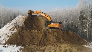 Экскаватор CASE CX300C в работе на строительстве М12