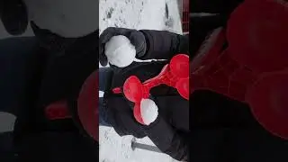 Snowball maker in action
