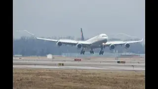 Condensation Lufthansa A340-600 landing, DTW