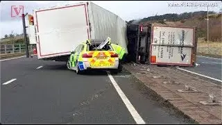 MUST SEE: High Winds In Scotland Causes Truck To Topple Over Onto a Police Car