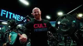 Dillon playing with the heavy dumbbells at CULT FITNESS