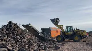 Doppstadt Inventhor Type 9 shredding through a massive pile of tires in AZ