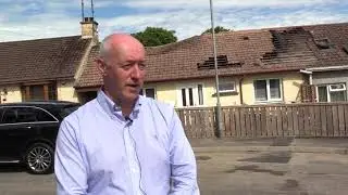 Councillor Declan Murphy at scene of devastating Bessbrook fire