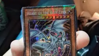 Opening Yu-Gi-Oh in da car with da midget:]