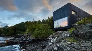 The Black House on the Isle of Skye balances modernity and vernacular architecture on a rocky coast.