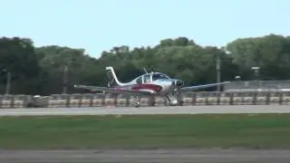Cirrus S22T, N831MM departing KOSH on 8/4/13 at 1729