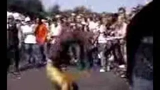 Same mosh kid does kicks and handstand during The Bled