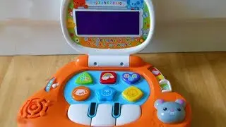 Vtech Baby's first learning Light-Up Laptop toy with music,letters, numbers,colors